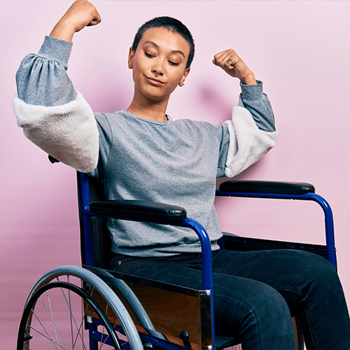 Confident woman in a wheelchair showing strength, representing independence and continence support services in Toongabbie, NSW.